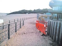 Beach access blocked by sand