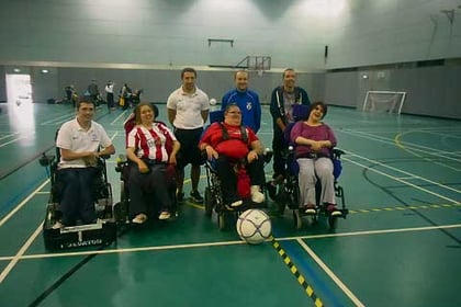 Residents try for wheelchair football