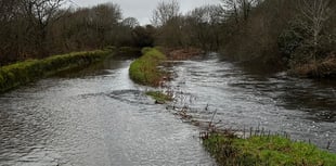 Crews rescue man trapped in car in moving flood water 