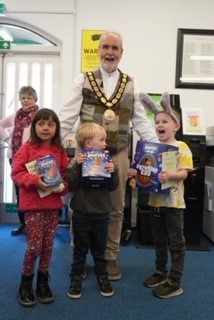 Easter bonnet competition winners Tyson, Benji and Senghala with mayor of Camelford Cllr Rob Rotchell