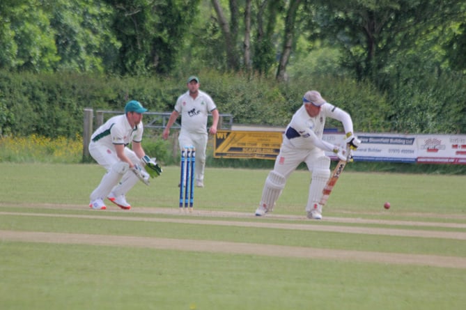 South Petherwin all-rounder Paul Clements gets forward during his crucial knock of 41 against Holsworthy on Saturday.