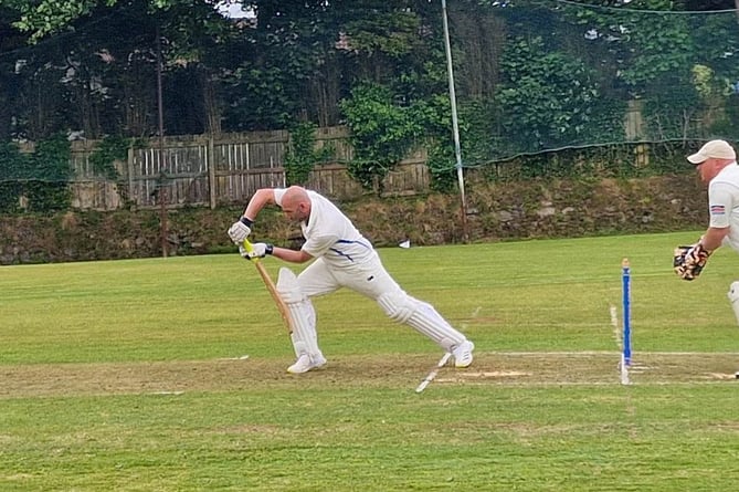 Graham Murray, who scored 42 before taking five Bugle wickets.