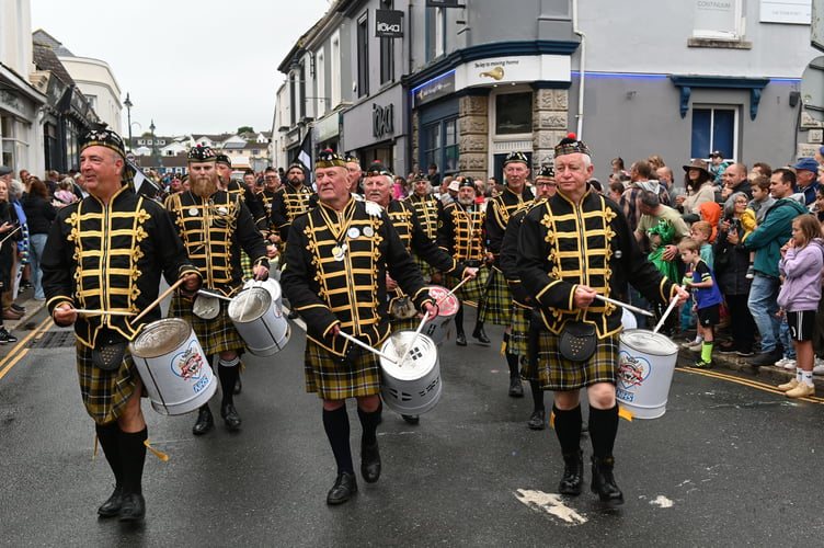 The Falmouth Marine Band makes it's way through the town centre