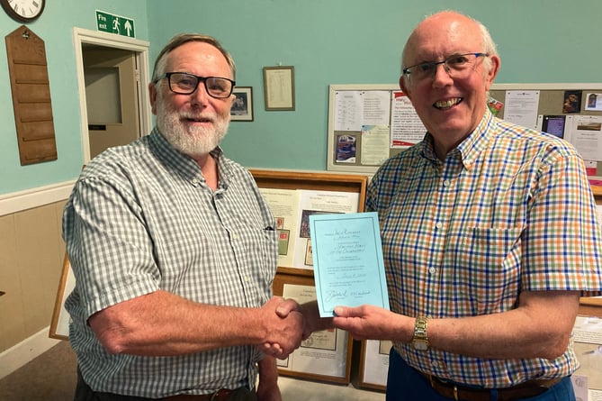 David Attwell presented David Richards with the Launceston Stamp Club’s certificate of appreciation