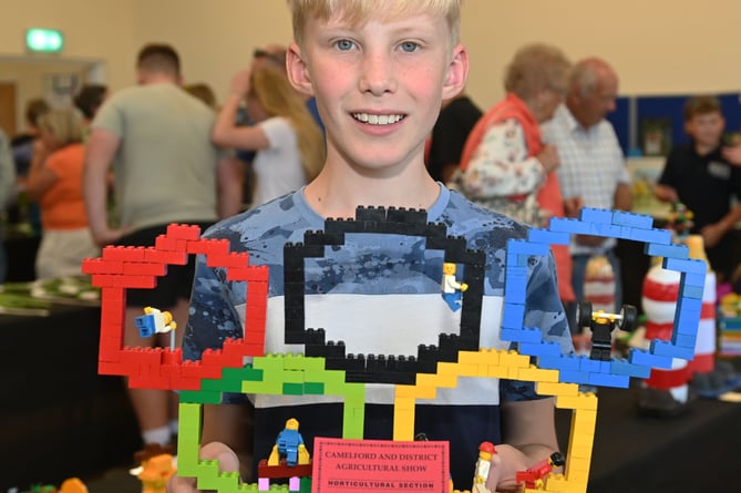 James Parsons proudly shows off his prize winning Lego model (Picture: Adrian Jasper)