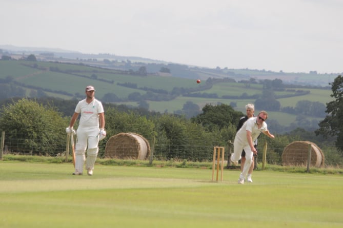 Werrington off-spinner Ben Sonley bowls as Luckett skipper Andrew Hoskin watches on during their Division Three East clash at Ladycross on Saturday. Picture: Paul Hamlyn