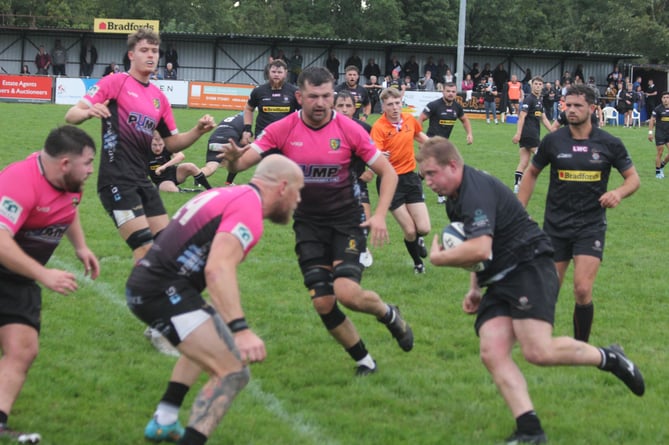 Launceston prop Mitch Hawken runs straight at Brixham winger Matt Crosscombe. Picture: Paul Hamlyn