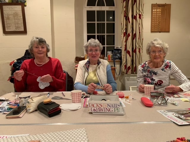 Carol Titcombe, Daphne Tucker and Vivienne Daniel enjoy a handicraft workshop at the September meeting of the Coad’s Green W.I.