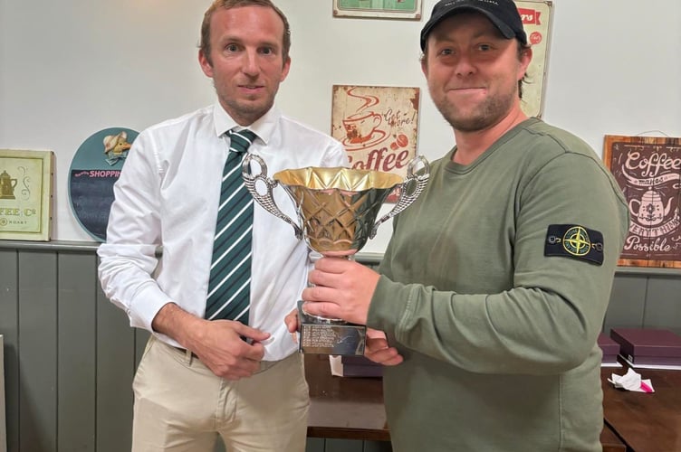 Jack Greening (right) was the the first team player of the year as well as taking as the batting and bowling awards. He's pictured with club chairman and first team captain, Ryan Walter. Picture: Holsworthy CC