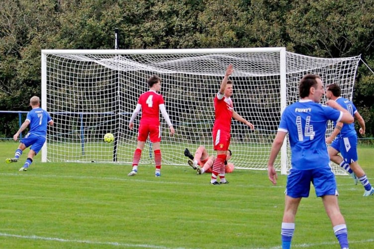 Steve Box runs to collect the ball after giving Bude hope against Wadebridge on Saturday. Picture: Chris Pointer