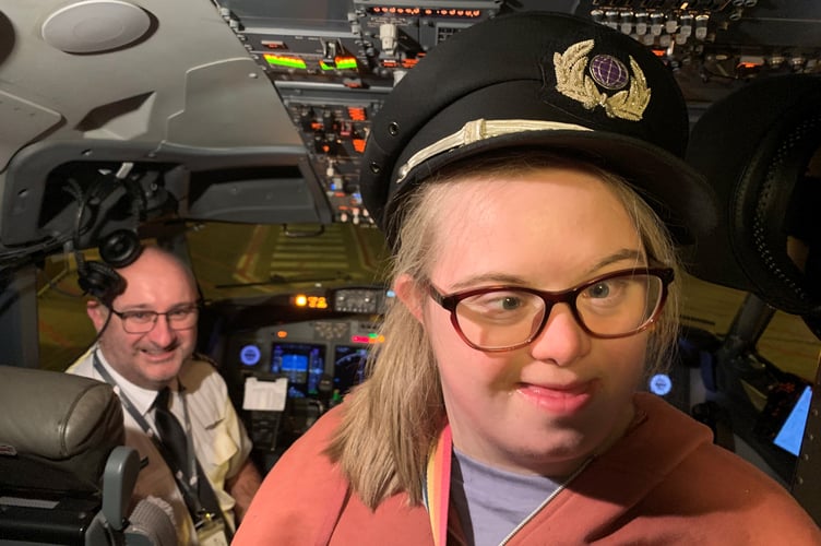 Nicole Armstrong of Launceston on board the plane to Australia