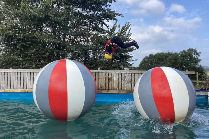 Showing off their skills on the water obstacle course. (Picture: Athena Learning Trust)