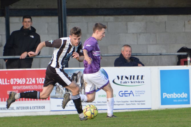 Holsworthy right-back for the afternoon, Sam Hill, looks to win possession. Picture: Rodney Parrish