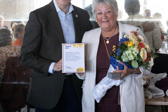 Marie Curie raise over Â£1M for Padstow to Rock swim, presentation by CEO Matthew Reed. Outgoing committee chairman Peter Tamblin, Lynda Thomas