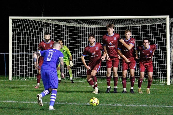 Bude's man of the match Joe Barker lines up a free-kick. Picture: Chris Pointer