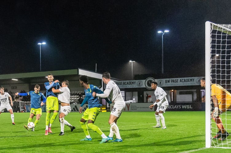 Andrew 'Rocky' Neal, pictured striking at goal, was superbly denied by Boreham Wood man of the match: Nathan Ashmore. Picture: Colin Bradbury