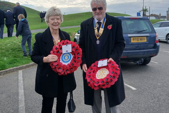 Di McDougall, president of Bude Inner Wheel and Martin Yeo, president of Bude Rotary Club preparing to lay wreaths on behalf of the clubs at the War Memorial in Bude recently