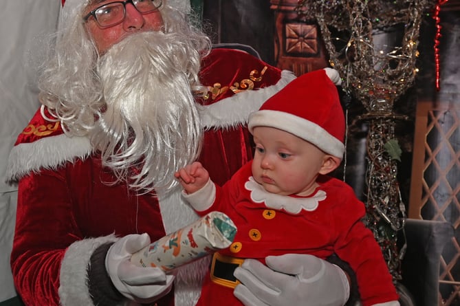 First time meeting Santa is 7 month old Reggie of South Petherwin