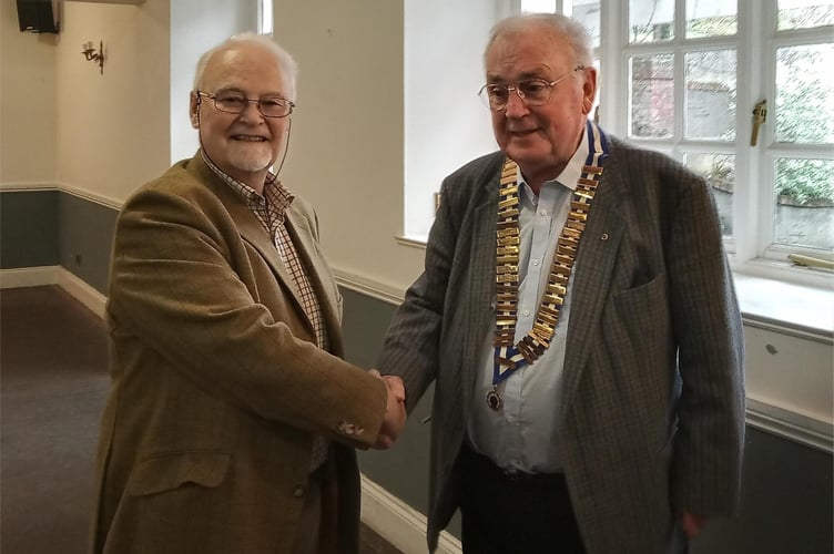 Probus Launceston 2024 chairman Paul (left) congratulates 2025 chairman Christopher